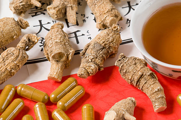 dry ginseng capsules and roots