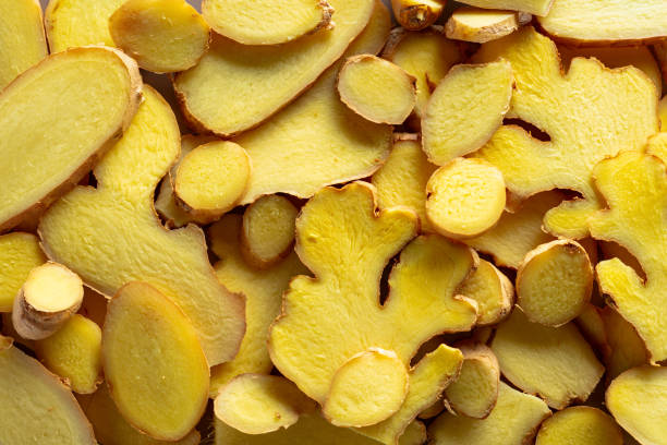 close up of fresh ginger slices. 